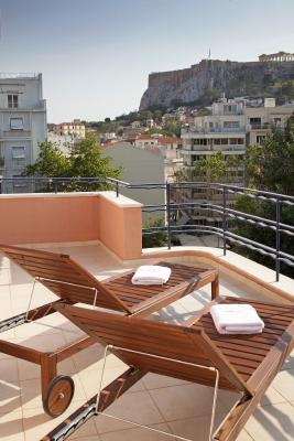 Panorama family room sezlong in veranda with view of acropolis hu 6948b887682e853f.jpg