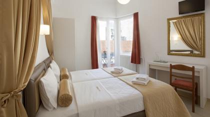 Triple room with corner balcony and view to the pedestrian street.jpg